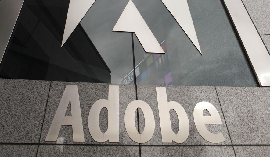 FILE - In this Dec. 15, 2009, file photo, the Adobe Systems Inc. headquarters is seen in San Jose, Calif. Google, Apple, Intel and Adobe Systems announced Thursday, April 24, 2014, they have settled a class-action lawsuit alleging they conspired to prevent their engineers and other highly sought technology workers from getting better job offers from one another. (AP Photo/Paul Sakuma, File)
