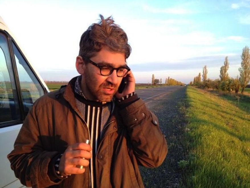 This is reportedly the first image captured of Vice News reporter Simon Ostrovsky since his capture in Ukraine. (J-Francois Belanger)
