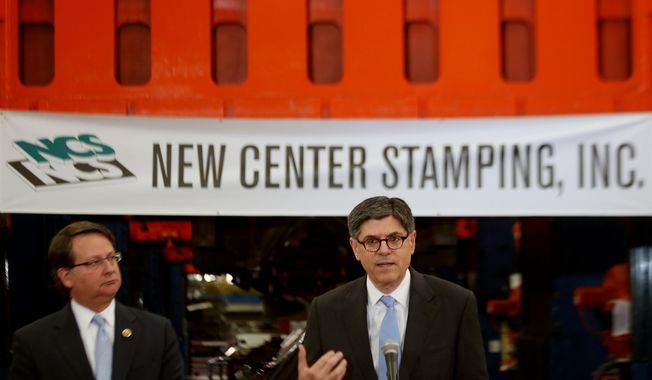 U.S. Treasury Secretary Jack Lew, right, speaks during a visit to the New Center Stamping facility in Detroit Friday, April 25, 2014, as Congressman Gary Peters look on. (AP Photo/Detroit Free Press, Regina H. Boone)  DETROIT NEWS OUT, TV OUT, INTERNET OUT, MAGS OUT, NO SALES, MANDATORY CREDIT