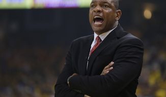 Los Angeles Clippers coach Doc Rivers yells out instructions as his team plays the Golden State Warriors during the first half in Game 3 of an opening-round NBA basketball playoff series, Thursday, April 24, 2014, in Oakland, Calif. (AP Photo/Marcio Jose Sanchez)