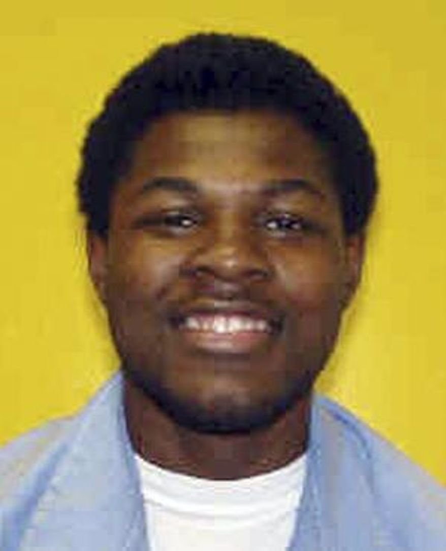 This undated photo provided by the Ohio Dept. of Rehabilitation and Corrections shows Brandon Moore. The Ohio Supreme Court plans to hear an appeal from Moore, who claims a 115-year prison sentence imposed when he was 15 years old violates his constitutional rights. Moore was tried as an adult and convicted by a jury in the 2001 armed kidnapping, robbery and gang rape of a 21-year-old woman. (AP Photo/Ohio Dept. of Rehabilitation and Corrections)