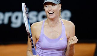 Russia&#39;s Maria Sharapova celebrates after winning her semifinal match against Sara Errani of Italy at the Porsche tennis Grand Prix in Stuttgart, Germany, Saturday, April 26, 2014. Sharapova won the match with 6-1 and 6-2. (AP Photo/dpa, Bernd Weissbrod)