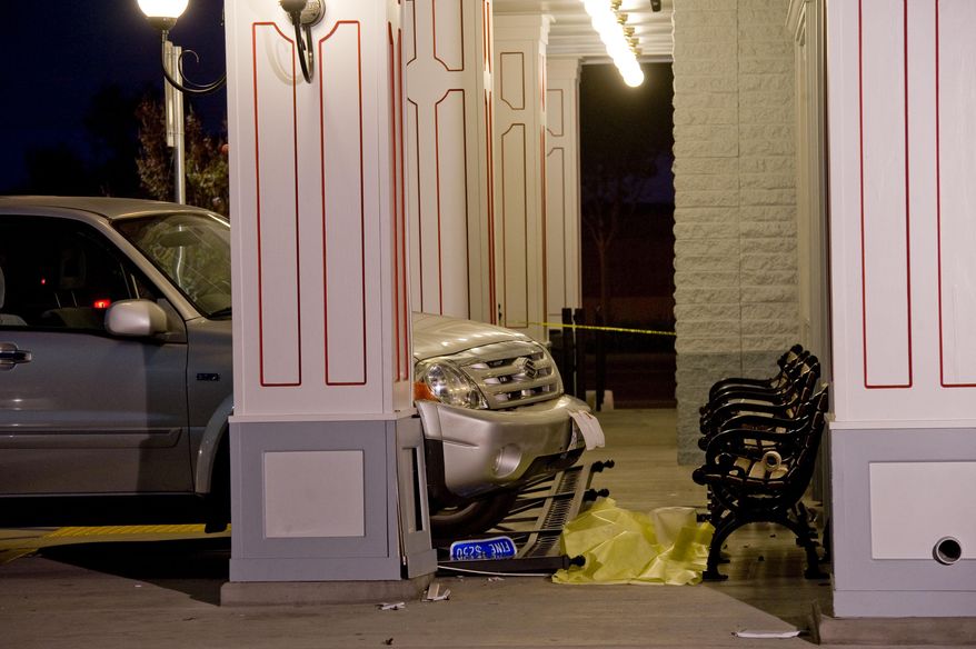 The SUV that was driven by a 70-year-old man still sits at the spot in front of Farrell's Ice Cream Parlour in Buena Park, Calif. where one woman was fatally injured and six others received moderate to minor injuries. The people were waiting to enter the restaurant around 6 p.m. PDT Friday April 25, 2014 when the accident occurred Friday. (AP Photo/The Orange County Register, Paul Rodriguez)