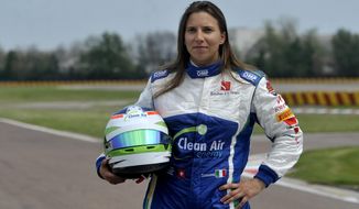 Simona De Silvestro, of Switzerland, poses prior to a training session at Ferrari&#39;s Fiorano test track, near Modena, Italy, Saturday, April 26, 2014. Simona de Silvestro is an affiliated driver with Sauber this year with a goal of competing for a Formula One seat in 2015. The Swiss driver has spent the last four years racing in IndyCar, and scored her first career podium in October with a second-place finish at Houston. It was the first podium finish for a woman on a road course in IndyCar. The 25-year-old De Silvestro has been spending this year testing, participating in simulator training and preparing for the mental and physical demands of F1. Sauber says the goal is to help De Silvestro earn her F1 super license and prepare for a seat in 2015. (AP Photo/Marco Vasini)