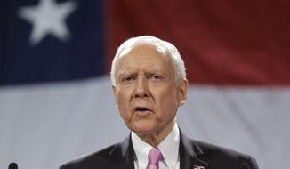 Sen. Orrin Hatch, R-Utah, addresses a crowd during the Utah Republican Party nominating convention, Saturday, April 26, 2014, in Sandy, Utah. About 4,000 Republican delegates are gathered for the convention Saturday to pick the party&#39;s candidates for four congressional seats and nine legislative races. (AP Photo/Rick Bowmer) 