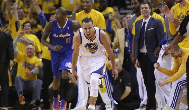 Golden State Warriors&#x27; Stephen Curry (30) celebrates after scoring next to Los Angeles Clippers&#x27; Jamal Crawford (11) during the first half in Game 4 of an opening-round NBA basketball playoff series on Sunday, April 27, 2014, in Oakland, Calif. (AP Photo/Marcio Jose Sanchez)
