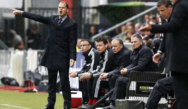 Ajax coach Frank de Boer reacts during the match between Heracles and Ajax at Polman stadium in Almelo, Netherlands, Sunday, April 27, 2014. (AP Photo/Vincent Jannink)