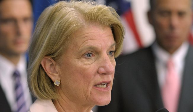 FILE - In this June 26, 2013 file photo, Rep. Shelly Moore Capito, R-W.Va. speaks on Capitol Hill in Washington. Moore Capito is running in the May 13 primary for the seat being vacated by retiring Democratic Sen. Jay Rockefeller.   (AP Photo/Cliff Owen, File)