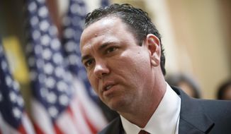 FILE - In this Nov. 21, 2013, then-photo newly-elected Rep. Vance McAllister, R-La., waits to be sworn in on Capitol Hill in Washington. A top official in McAllister&#x27;s office says the Louisiana Republican will not seek re-election. (AP Photo/J. Scott Applewhite, File)