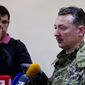 This image taken from Associated Press video shows Igor Strelkov, military commander of pro-Russian militias in Slovyansk talking to journalists in Slovyansk, Ukraine, Sunday, April 27, 2014. Strelkov has been identified as a Russian security services operative by Ukraine&#39;s government. In what appeared to be a closely vetted interview to Russian media, Strelkov did not directly deny the accusation, saying the uprising in Ukraine was being carried out by opponents of the &amp;quot;Kiev junta&amp;quot; — language similar in tone to that adopted by the Kremlin leadership. (AP Photo/Associated Press Video)