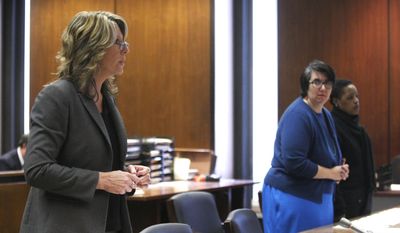 Assistant Prosecutor Michele Miller, left, addresses the court as defense attorney Susan Freedman, center, and her client Haniyyah Barnes listen, Tuesday, April 29, 2014, in Newark, N.J. The Star-Ledger of Newark reports that Barnes pleaded guilty to breaking into her neighbor&#x27;s home, grabbing the 2-year-old Shih Tzu and throwing the dog into oncoming traffic in August 2011, where she was struck by a vehicle and killed. Barnes will be sentenced July 14. (AP Photo/The Star-Ledger, Patti Sapone, Pool)