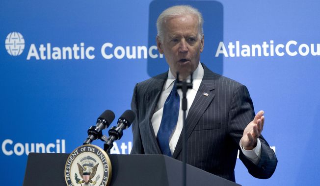 Vice President Joe Biden is seen behind a teleprompter as speaks at the Atlantic Council&#x27;s conference, in a special tribute to NATO and the European Union, Wednesday, April 30, 2014, in Washington. Biden drew parallels between Russia&#x27;s interference in Ukraine and the world wars of the last century. Biden said Ukraine&#x27;s struggles start with Russia&#x27;s acute violation of rules that the 20th century taught us must be upheld. He says Russia has violated the fundamental principle that Europe&#x27;s borders cannot be changed by military force. (AP Photo/Jose Luis Magana)