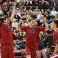 Stanford&#39;s Eric Mochalski (13) and Steven Irvin (12) celebrate after Conrad Kaminski scored against BYU during the fourth set of an NCAA men&#39;s college volleyball tournament semifinals in Chicago on Thursday, May 1, 2014. (AP Photo/Nam Y. Huh)