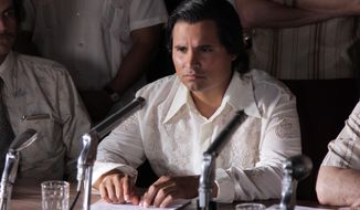 FILE - In this undated file photo released by Pantelion Films shows Michael Pena as Cesar Chavez in a scene from &amp;quot;Cesar Chavez.&amp;quot;  The movie that opened Thursday, May 1, 2014, Labor Day in Latin America, is titled “El Mexicano que desafio a los Estados Unidos,” or “The Mexican who Defied the United States,” with the subtitle “Who the hell is Cesar Chavez?” (AP Photo/Pantelion Films, File)