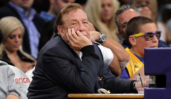 FILE - In this Feb. 25, 2011, file photo, Los Angeles Clippers owner Donald Sterling looks on during the first half of their NBA basketball game against the Los Angeles Lakers in Los Angeles. NBA Commissioner Adam Silver has banned Sterling for life and fined him $2.5 million for making racist comments. (AP Photo/Mark J. Terrill, File)