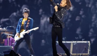 ** FILE ** In this Feb. 26, 2014 file photo, the Rolling Stones perform during their concert at Tokyo Dome in Tokyo. Israeli concert promoter Shuki Weiss said Tuesday, March 25, 2014, that the legendary band will play in Tel Aviv on June 4, 2014. (AP Photo/Shizuo Kambayashi, File)