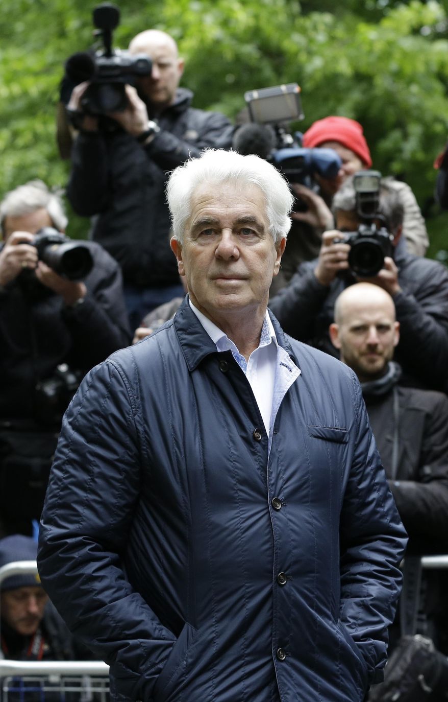 Max Clifford arrives for sentencing at Southwark Crown Court in London, Friday, May 2, 2014. Clifford, once one of the most powerful figures in the British entertainment world, could face jail today when he is sentenced for a string of indecent assaults. Clifford, 71, was found guilty Monday of eight counts of indecent assault stemming from attacks on teenagers dating back more than 40 years. (AP Photo/Kirsty Wigglesworth)
