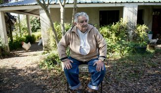 Uruguay&#39;s President Jose Mujica sits outside his home during an interview on the outskirts of Montevideo, Uruguay, Friday, May 2, 2014. Mujica said Friday that his country’s legal marijuana market will be much better than Colorado’s, where he says the rules are based on “fiction” and “hypocrisy” because the state loses track of the drug once it’s sold and many people fake illnesses to get prescription weed. Mujica says this won’t be allowed in Uruguay, where the licensed and regulated market will be much less permissive with drug users. (AP Photo/Matilde Campodonico)