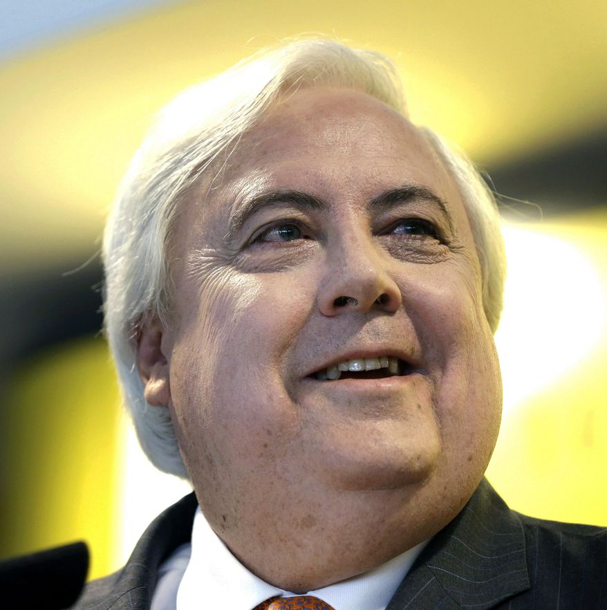 In this Feb. 26, 2013 file photo, Australian billionaire Clive Palmer speaks during a news conference in New York, about his intention to build the Titanic II. Palmer is a larger-than-life Australian multimillionaire whose headline-grabbing projects include building a replica of the Titanic and a Jurassic Park-style collection of 160 mechanized dinosaurs. (AP Photo/Seth Wenig, File)