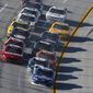Elliott Sadler (11) leads a pack of cars during the NASCAR Aaron&#x27;s 312 Nationwide series auto race at Talladega Superspeedway, Saturday, May 3, 2014, in Talladega, Ala. (AP Photo/John Bazemore)