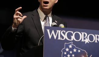 Wisconsin Sen. Ron Johnson, R-Wis., speaks at the Republican party of Wisconsin State Convention Saturday, May 3, 2014, in Milwaukee. (AP Photo/Jeffrey Phelps) 