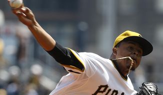 Pittsburgh Pirates starting pitcher Edinson Volquez throws against the Toronto Blue Jays in the first inning of a baseball game on Sunday, May 4, 2014, in Pittsburgh. (AP Photo/Keith Srakocic)