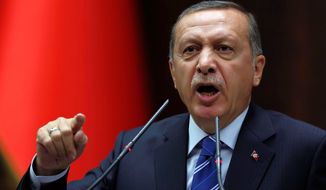 Prime Minister Recep Tayyip Erdogan ordered Twitter and YouTube blocked and even threatened to &quot;eradicate Twitter&quot; to show the international community &quot;the power of the Turkish republic.&quot; (Associated Press)