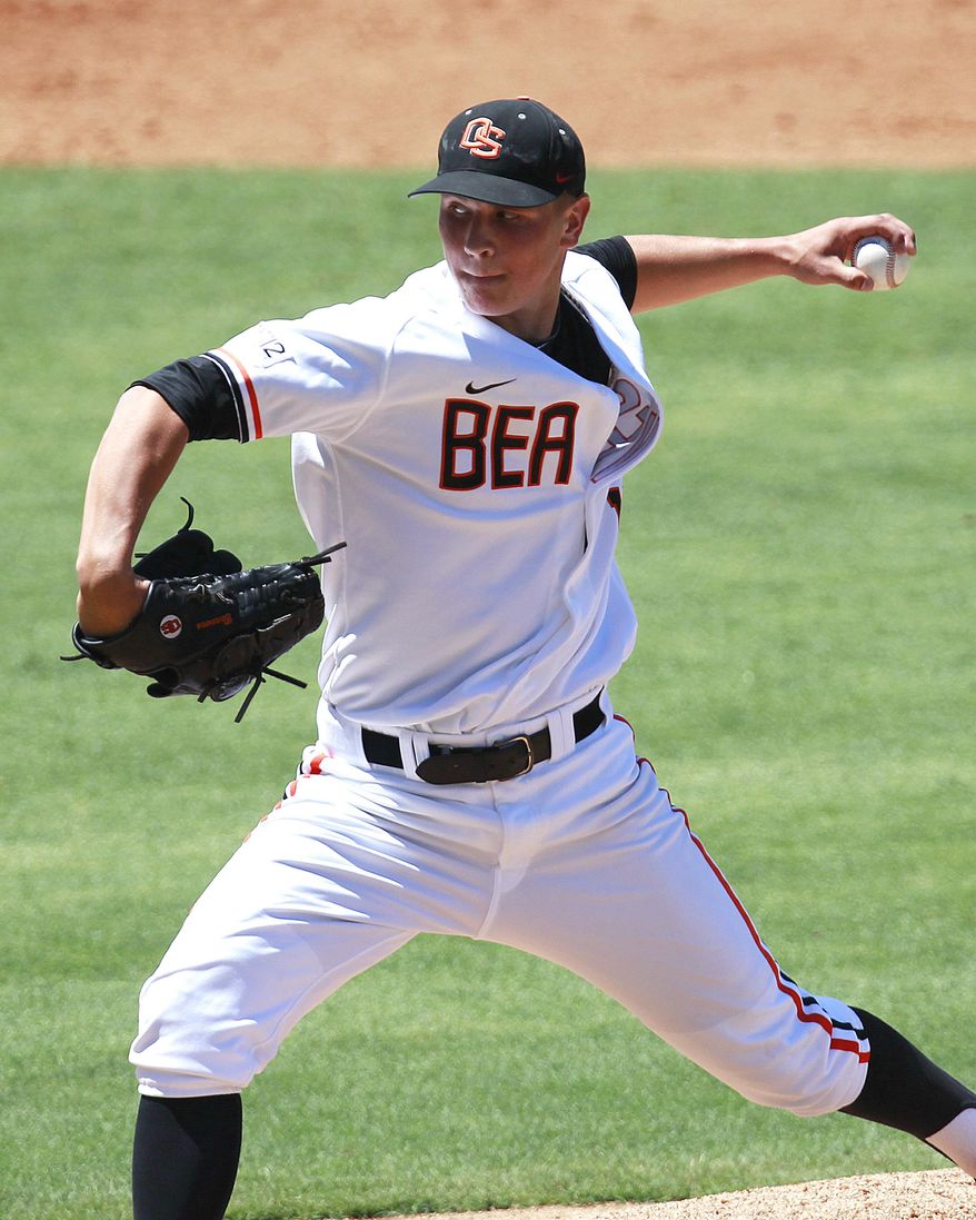 FILE - In this June 1, 2012 file photo, Oregon State pitcher Jace Fry throws in the second inning against Belmont during an NCAA regional tournament college baseball game in Baton Rouge, La. On Sunday, May 4, 2014, Fry allowed one hit in his third complete-game shutout of the season in Oregon State’s 5-0 win at California. The victory was OSU's seventh in a row and finished its fourth Pac-12 sweep of the season. Fry has allowed two hits in his last 17 innings. (AP Photo/Gerald Herbert, File)
