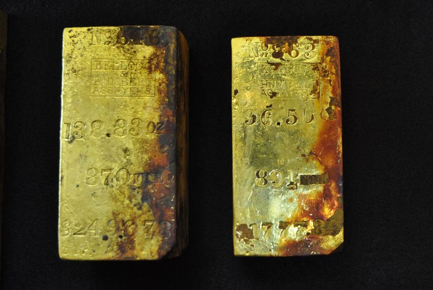 Gold bars recovered from the wreck of the S.S. Central America off the South Carolina coast are seen in this April 15, 2014 photograph provided by Odyssey Marine Exploration Inc. Odyssey announced on Monday, May 5, 2014, that the bars are among nearly 1,000 ounces of gold that has been initially recovered from the wreck of the ship that sank during a hurricane in 1857. An earlier expedition a quarter-century ago recovered gold bars and coins worth about $50 million at that time. (AP Photo/Courtesy Odyssey Marine Exploration Inc.)