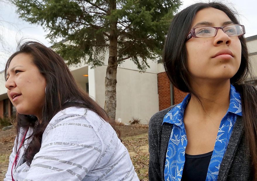 With her daughter Deanna due to receive a large allocation of money from the Ho-Chunk Nation following graduation from high school, Kim Ramirez hopes her children will be smarter with the money than she was when she was younger. Deanna, now a sophomore, plans on attending college after graduating in 2016. They are pictured outside the school Friday, April 11, 2014. (AP Photo/Wisconsin State Journal, John Hart)