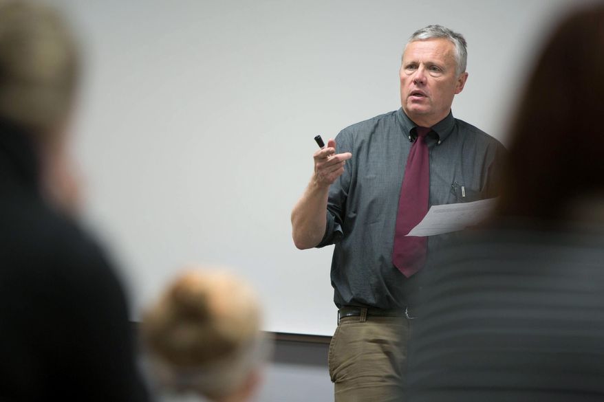 Graphic Design Professor Brad Hokanson during his Creative Problem Solving class Thursday, April 24, 2014 at the University of Minnesota. Some of the class material, including video lectures and assignments, is available as a Massive Open Online Course. (AP Photo/Minnesota Public Radio, Jennifer Simonson)