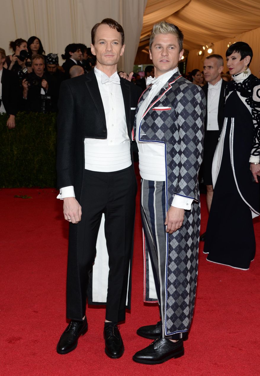 Neil Patrick Harris, left, and David Burtka attend The Metropolitan Museum of Art's Costume Institute benefit gala celebrating "Charles James: Beyond Fashion" on Monday, May 5, 2014, in New York. (Photo by Evan Agostini/Invision/AP)
