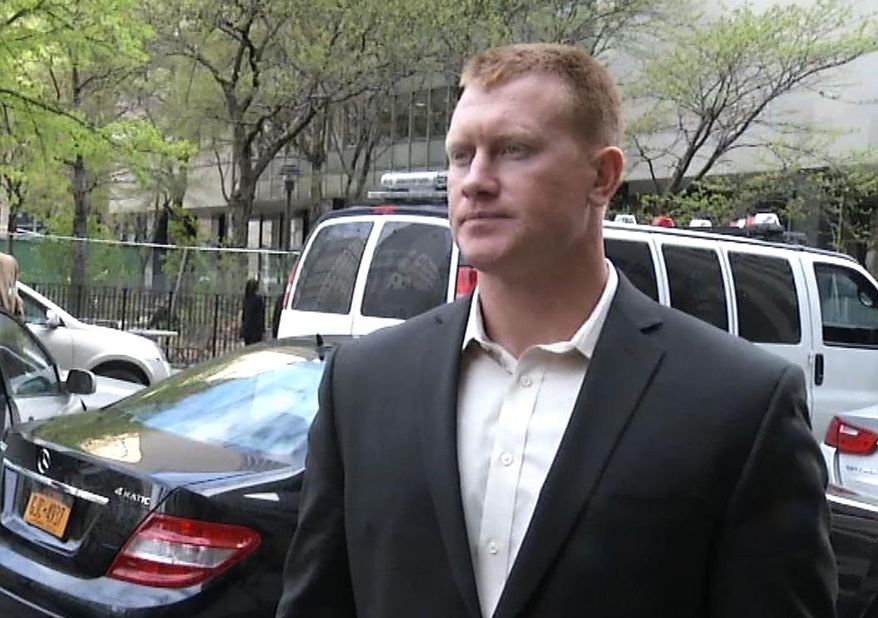 In this photo taken from video, skydiver James Brady, who parachuted off 1 World Trade Center last year, leaves state Supreme Court following his arraignment, Tuesday, May 6, 2014 in New York. Brady and two co-defendants were charged with burglary and reckless endangerment for their daring escapade the night of Sept. 30, 2013. (AP Photo/Ted Shaffrey)
