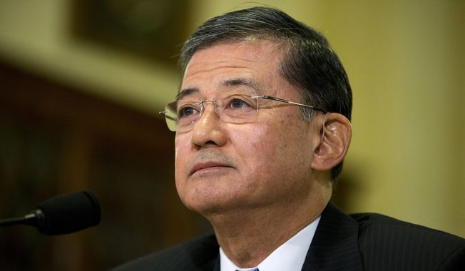 FILE - In this Oct. 9, 2013, file photo, Veterans Affairs Secretary Eric Shinseki listens as he testifies on Capitol Hill in Washington. Senate Republican leader Mitch McConnell of Kentucky says a leadership change may help resolve what he calls &amp;quot;dysfunction&amp;quot; at the Department of Veterans Affairs, following allegations of corruption and avoidable deaths at the veterans&#x27; hospital in Phoenix. McConnell says the tenure of Veterans Affairs Secretary Eric Shinseki is &amp;quot;embarrassing&amp;quot; and that the agency is in &amp;quot;a stunning period of dysfunction.&amp;quot; McConnell isn&#x27;t calling for Shinseki to step down, but says a change in leadership &amp;quot;might be a good thing.&amp;quot;(AP Photo/ Evan Vucci, File)
