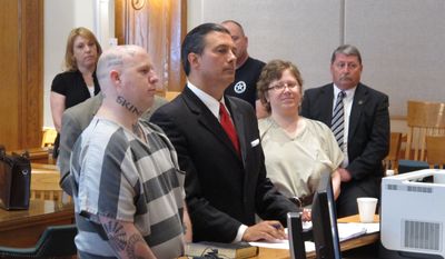 From left, Jeremy Moody, lawyer Harry Dest and Christine Moody appear before a judge as the Moody&#39;s get ready to plead guilty to murder on Tuesday, May 6, 2014, in Union, S.C. Prosecutors said the husband and wife killed Charles Parker in his home in July 2013 because he was a sex offender and his wife Gretchen Parker because she was there. (AP Photo/Jeffrey Collins)