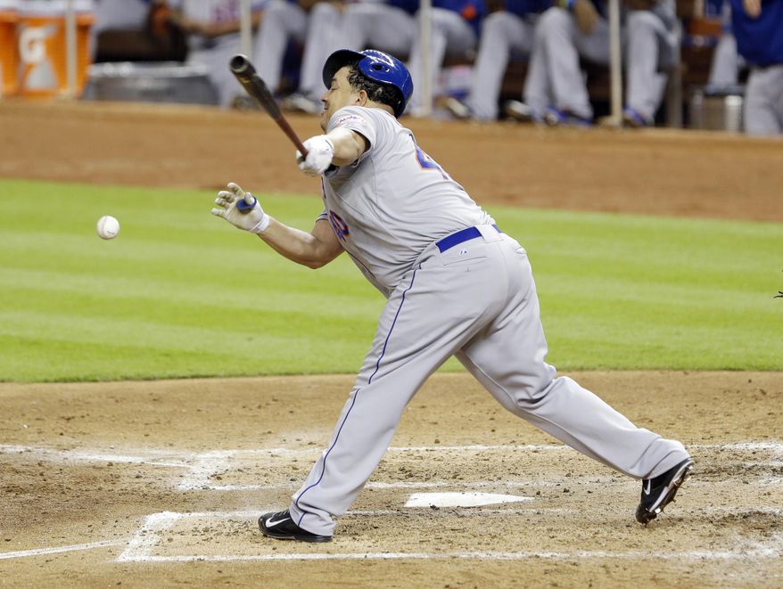 New York Mets' Bartolo Colon fouls the ball as he hits during the sixth inning of a baseball game against the Miami Marlins, Tuesday, May 6, 2014, in Miami. The Marlins won 3-0. (AP Photo/Wilfredo Lee)