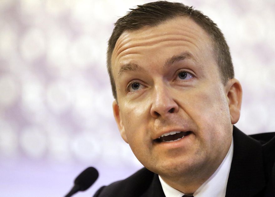 FILE - In this April 8, 2014 file photo, Illinois state Sen. Andy Manar, D-Bunker Hill, testifies during a Senate committee hearing at the Capitol in Springfield Ill. Manar has revised an education funding reform proposal in the hopes of gaining more bipartisan support. His proposal would require state school districts to demonstrate need before receiving money. (AP Photo/Seth Perlman, File)