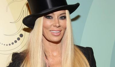 **FILE** Former adult film star Jenna Jameson arrives at Perez Hilton&#39;s 34th Birthday and Mad Hatter&#39;s Ball on March 24, 2012, at Siren Studios in Los Angeles. (Associated Press/Donald Trail for Perez Hilton)