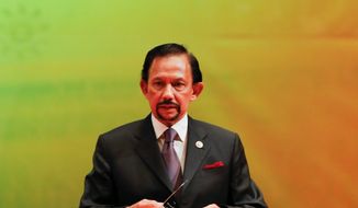 In this file photo taken Thursday, Oct. 10, 2013, Brunei&#x27;s Sultan Hassanal Bolkiah speaks during the closing ceremony and handover of the ASEAN Chairmanship to Myanmar in Bandar Seri Begawan. Hollywood is responding to harsh new laws in Brunei by boycotting the Beverly Hills Hotel. The Motion Picture &amp; Television Fund joined a growing list of organizations and individuals Monday, May 5, 2014, refusing to do business with hotels owned by the Sultan or government of Brunei to protest the country&amp;#8217;s new penal code that calls for punishing adultery, abortions and same-sex relationships with flogging and stoning. (AP Photo/Vincent Thian, file)