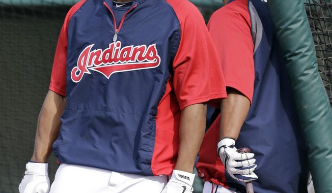 Cleveland Indians center fielder Michael Bourn leaves the cage during batting practice before a baseball game against the Minnesota Twins Wednesday, May 7, 2014, in Cleveland. Bourn hasn&#x27;t played since injuring his hamstring beating out a bunt against the Chicago White Sox May 3.   (AP Photo/Mark Duncan)