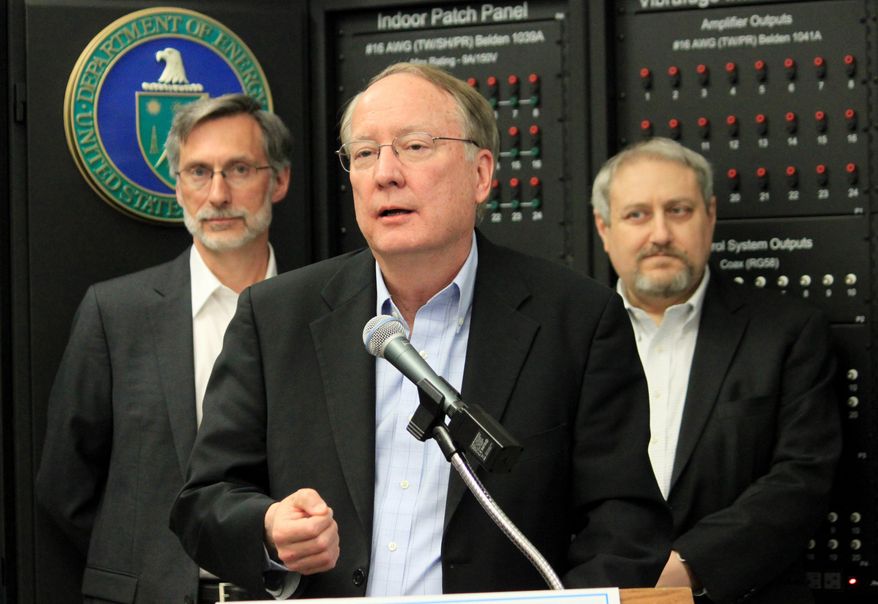 National Nuclear Security Administration Director Frank Klotz, center, talks about the challenges the agency will have as it tries to modernize some of its facilities during a new conference at Sandia National Laboratories in Albuquerque, N.M., on Thursday, May 8, 2014. (AP Photo/Susan Montoya Bryan)