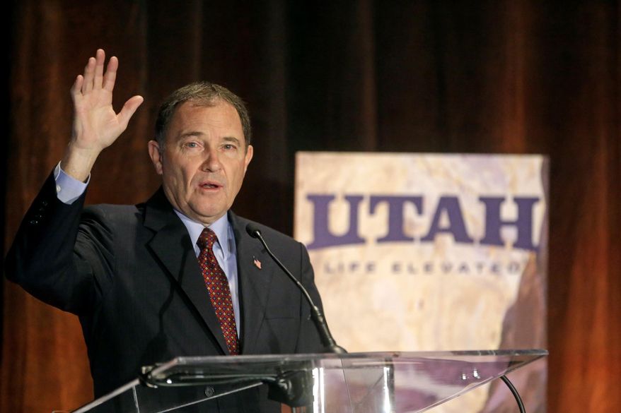 Utah Gov. Gary Herbert addresses the annual Outdoor Recreation Summit Thursday, May 8, 2014, in Salt Lake City. Gov. Herbert has kicked off his first annual Outdoor Recreation Summit by signing a long-awaited swap of state and federal lands in Grand, San Juan and Uintah Counties. The day's agenda includes discussions about public lands policy, business, recreation and tourism. (AP Photo/Rick Bowmer)