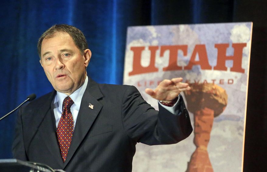Utah Gov. Gary Herbert addresses the annual Outdoor Recreation Summit Thursday, May 8, 2014, in Salt Lake City. Gov. Herbert has kicked off his first annual Outdoor Recreation Summit by signing a long-awaited swap of state and federal lands in Grand, San Juan and Uintah Counties. The day's agenda includes discussions about public lands policy, business, recreation and tourism. (AP Photo/Rick Bowmer)