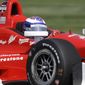 Scott Dixon, of New Zealand, drives through turn 13 during practice for the inaugural Grand Prix of Indianapolis IndyCar auto race at the Indianapolis Motor Speedway in Indianapolis, Thursday, May 8, 2014. (AP Photo/Michael Conroy)
