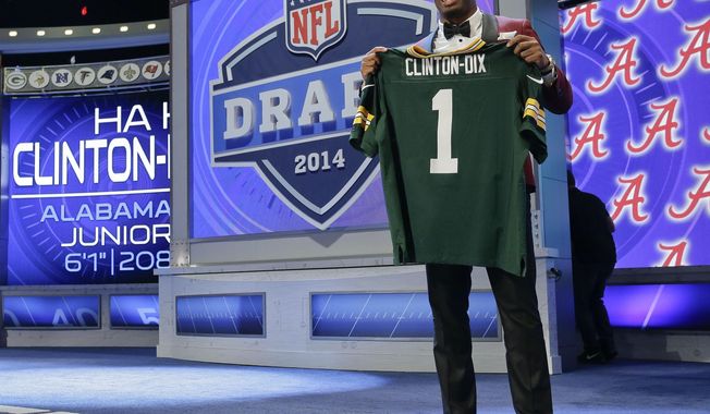 Alabama free safety Haha Clinton-Dix poses for photos after being selected by the Green Bay Packers as the 21st pick in the first round of the 2014 NFL Draft, Thursday, May 8, 2014, in New York. (AP Photo/Craig Ruttle)