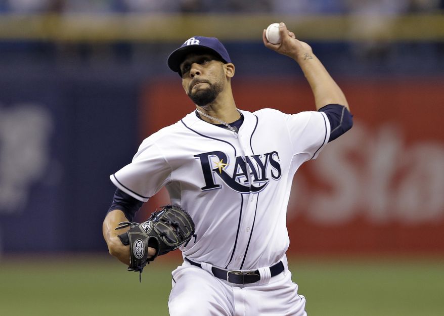 Tampa Bay Rays starting pitcher David Price delivers to Baltimore Orioles&#x27; Nelson Cruz during the first inning of a baseball game Thursday, May 8, 2014, in St. Petersburg, Fla. (AP Photo/Chris O&#x27;Meara)