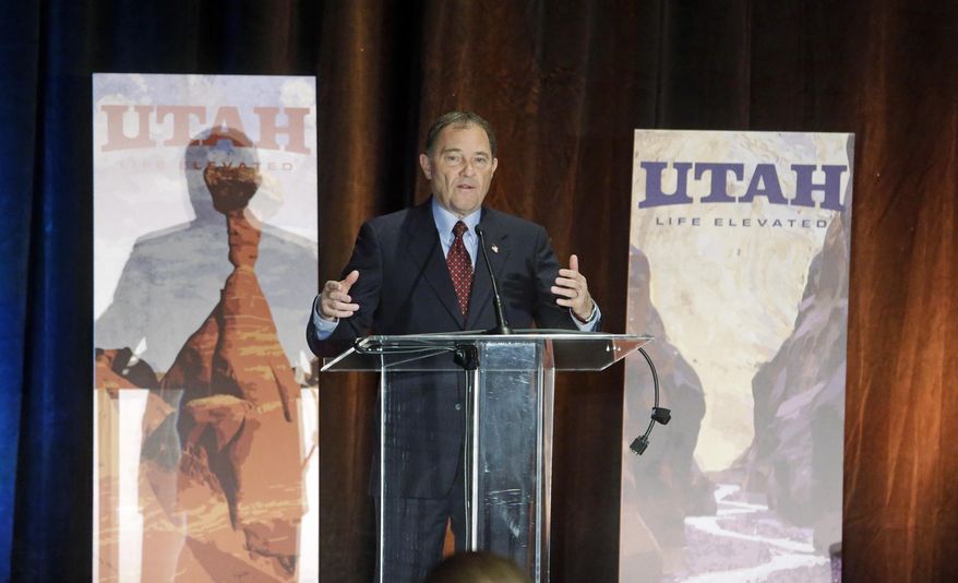 Utah Gov. Gary Herbert addresses the annual Outdoor Recreation Summit Thursday, May 8, 2014, in Salt Lake City. Gov. Herbert has kicked off his first annual Outdoor Recreation Summit by signing a long-awaited swap of state and federal lands in Grand, San Juan and Uintah Counties. The day's agenda includes discussions about public lands policy, business, recreation and tourism. (AP Photo/Rick Bowmer)