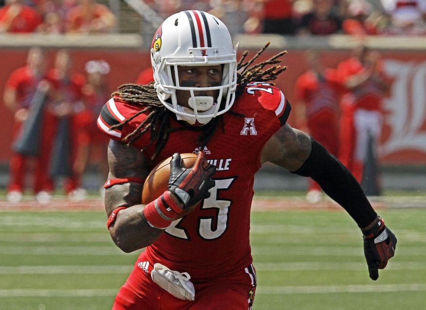 FILE - In this Sept. 7, 2013, file photo, Louisville's Calvin Pryor turns and runs after picking off a pass against Eastern Kentucky in an NCAA college football game in Louisville, Ky. Pryor was selected in the first round, 18th overall, by the New York Jets in the NFL draft on Thursday, May 8, 2014.  (AP Photo/Garry Jones, File)