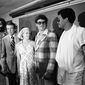 Washington Redskin head coach George Allen stands with two of his newly acquired running backs during a press conference at Redskins Park in Chantilly, Va., on Thursday, June 11, 1976.    From left are: Calvin Hill; Allen; Mrs. Mary Riggins; and John Riggins.  Mary Riggins is the wife of player Riggins.   (AP Photo/ Charles Harrity)