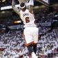 Miami Heat forward LeBron James dunks the ball during the first half of Game 2 of an Eastern Conference semifinal basketball game against the Brooklyn Nets, Thursday, May 8, 2014 in Miami. (AP Photo/Wilfredo Lee)